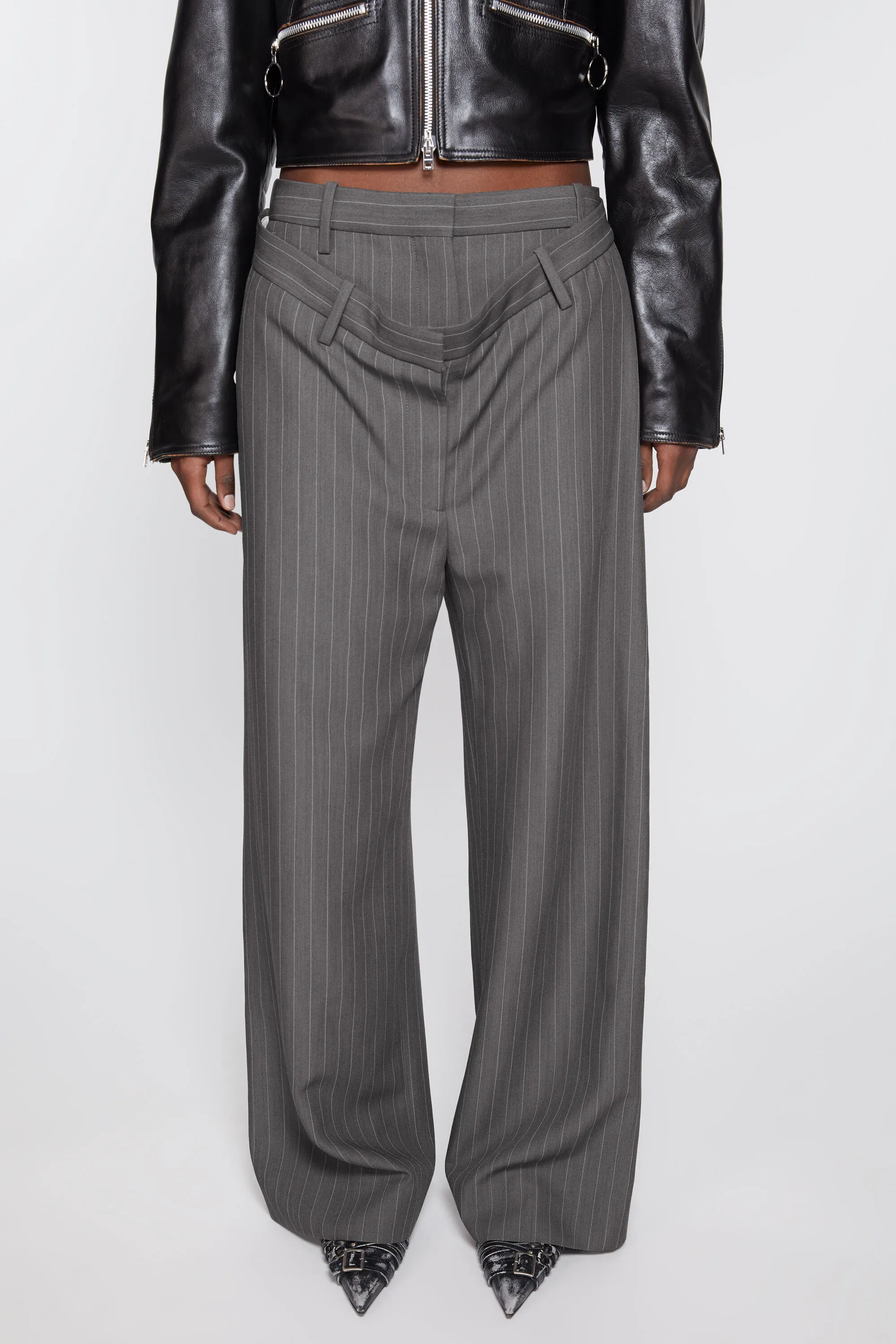 Deconstructed pinstripe trousers