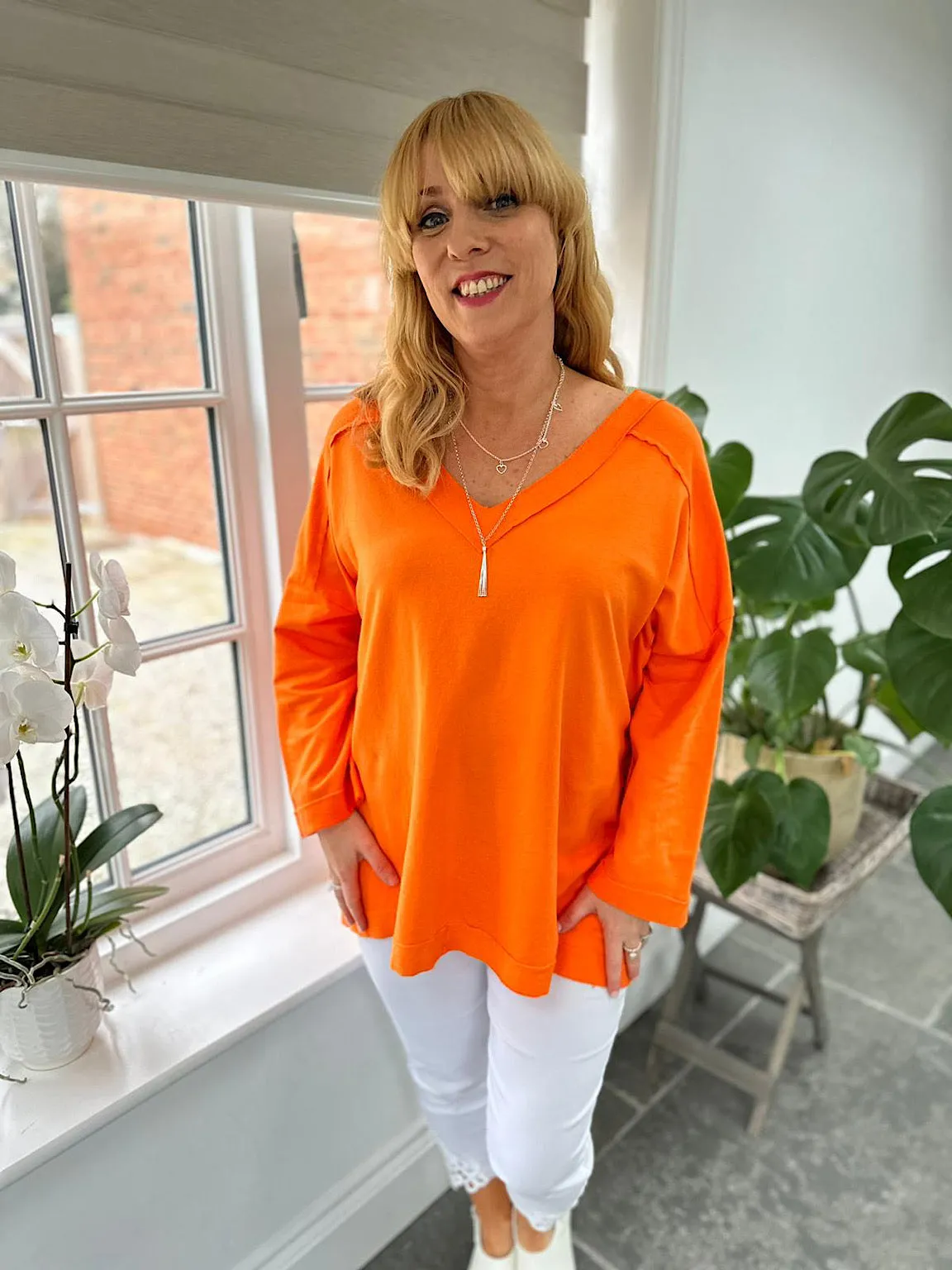 Orange Reverse Seam V Neck Sweat Top Harriet