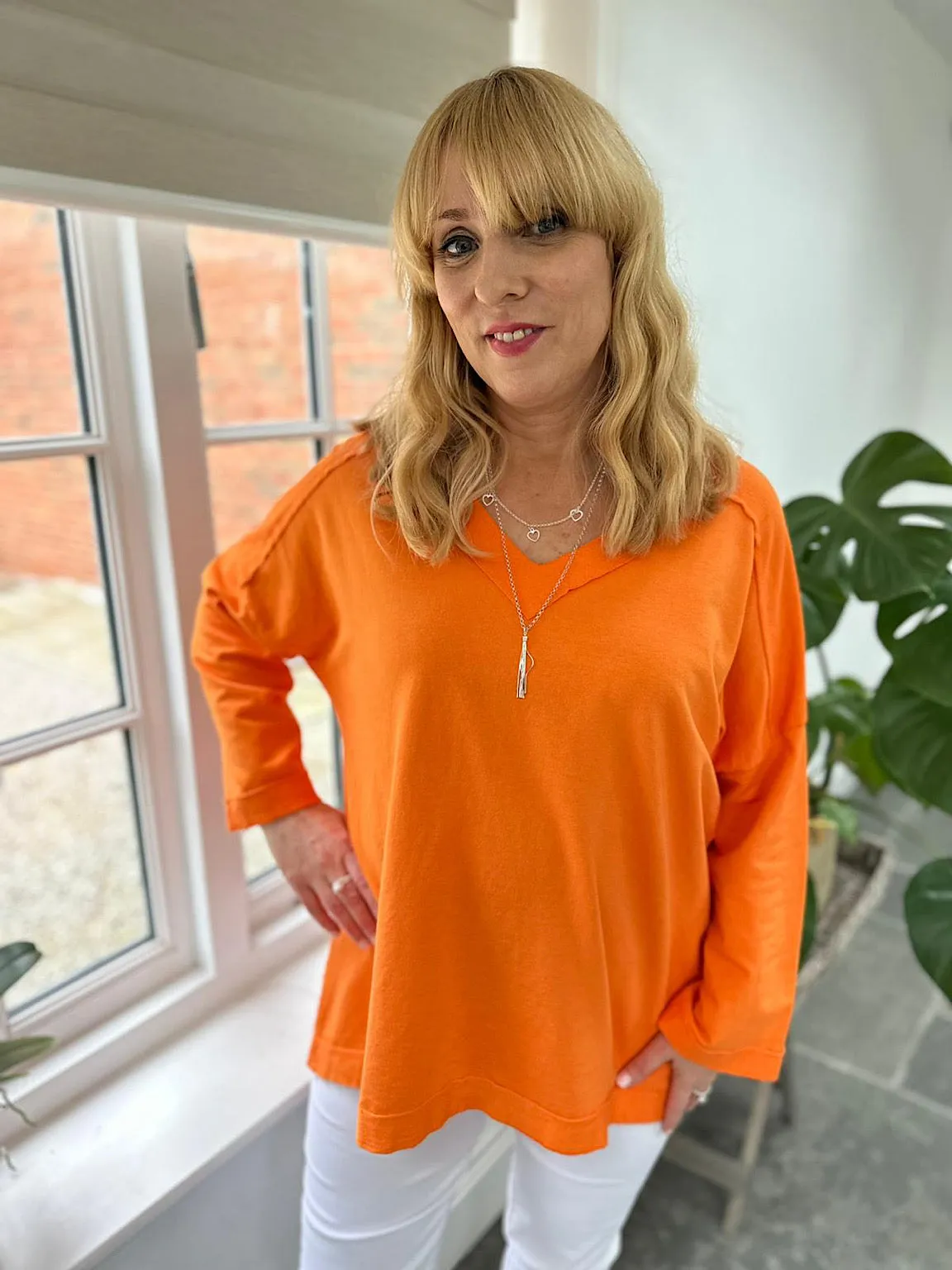 Orange Reverse Seam V Neck Sweat Top Harriet