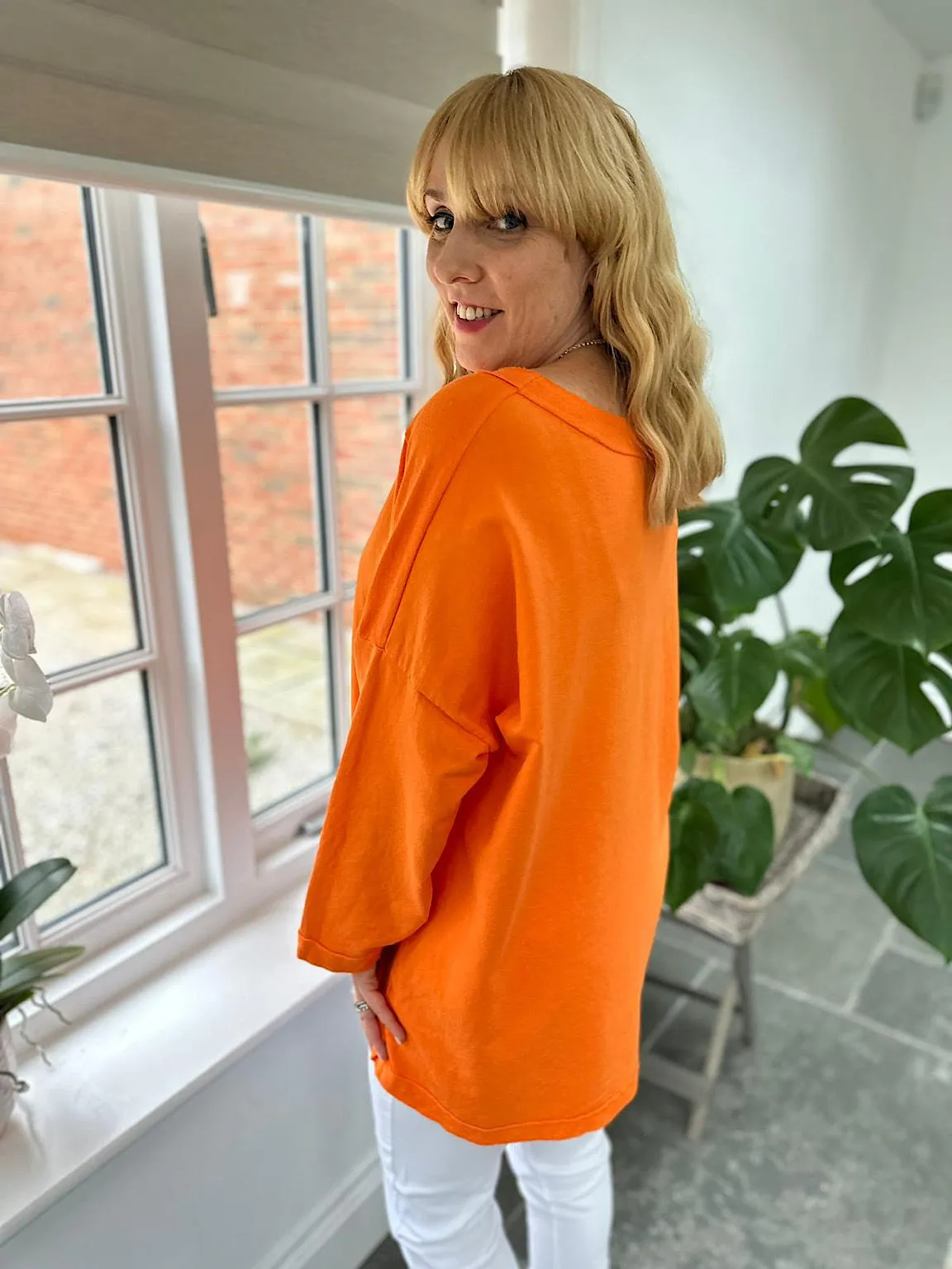 Orange Reverse Seam V Neck Sweat Top Harriet